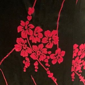 Silky sexy dress with slit on side and spaghetti straps.